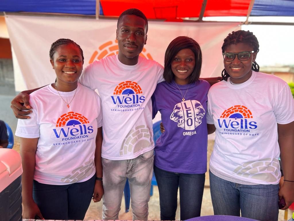 Wells Foundation volunteers at an orphanage celebration in Ghana